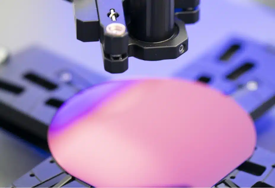 An image of a pink circle on a lithography machine.